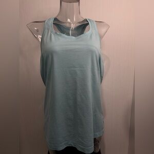 Lululemon Women’s Tank. L/XL? Teal. No flaws. 29” Long. 22” Across.